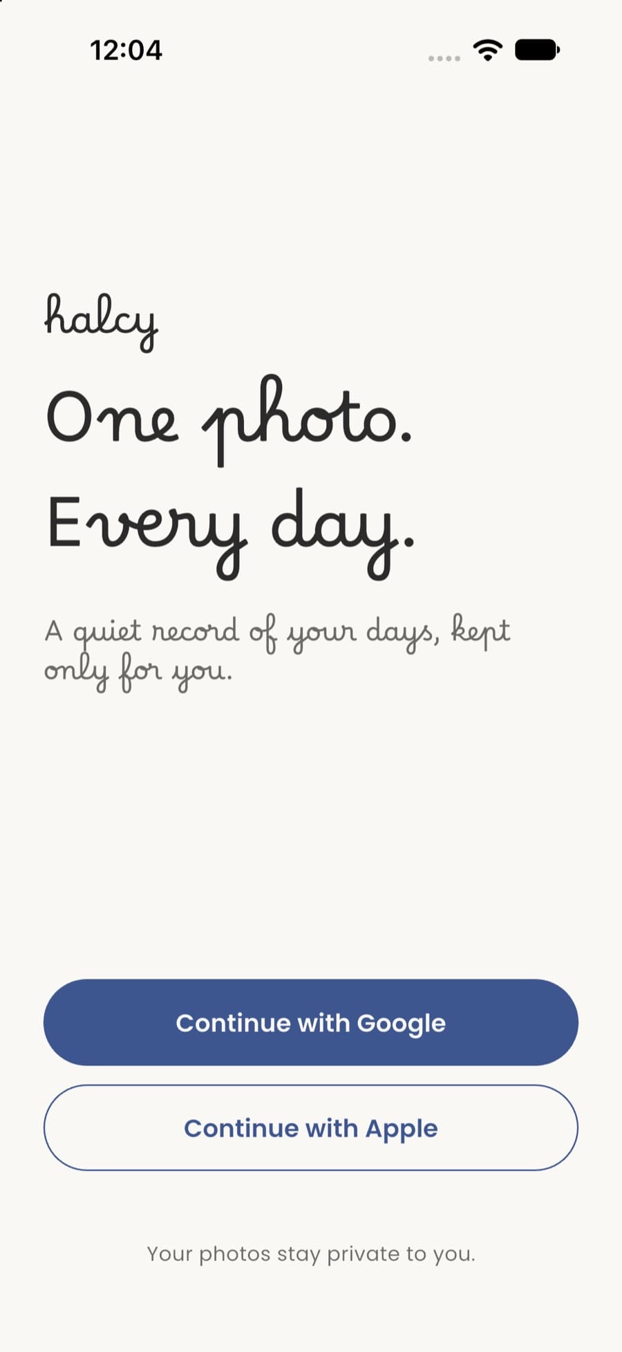 Halcy welcome screen reading “One photo. Every day.” with Continue with Google and Continue with Apple buttons